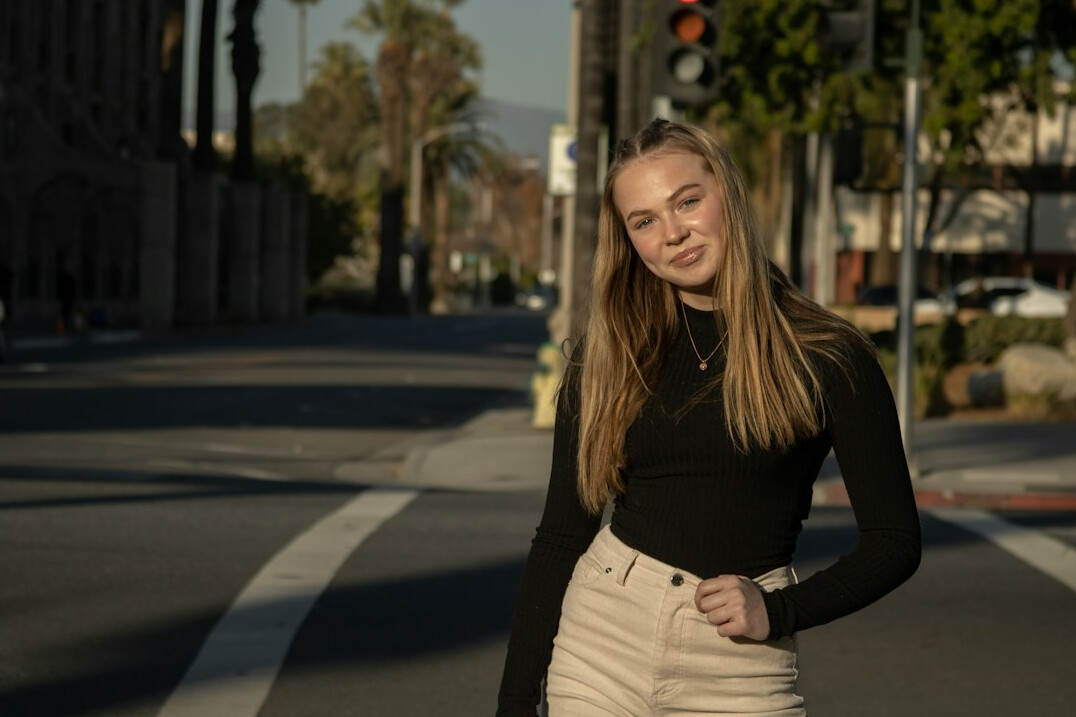 Portrait of a smiling woman in a business casual outfit