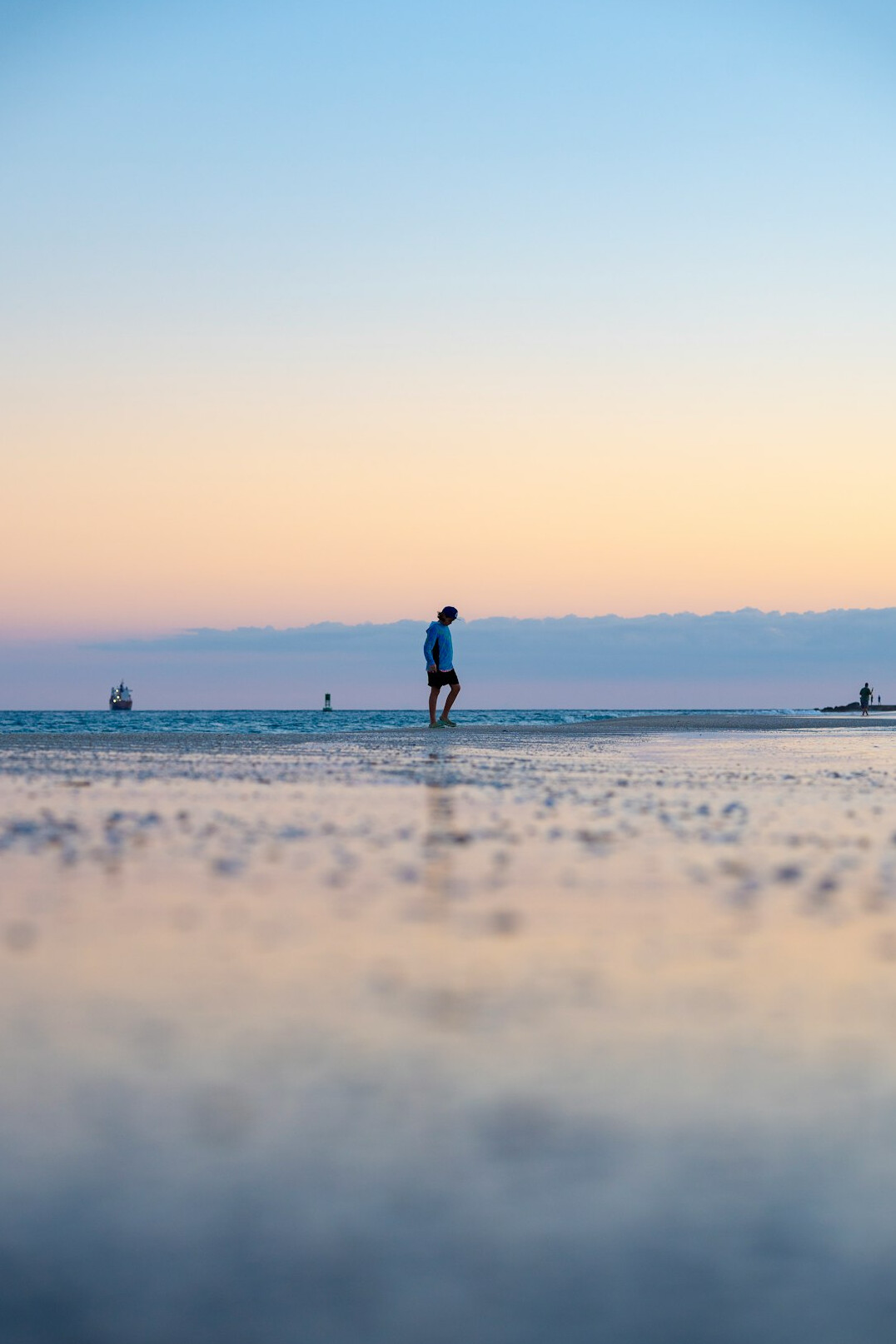 person walking in nature reflecting
